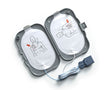 An opened Philips FRx SMART Pads II Defibrillation Electrode Pads case displaying two Philips Adult FRx SMART Pads, each with illustrations indicating their placement on the body: the right pad is shown positioned above the right chest, while the left pad is shown placed on the left side below the armpit.