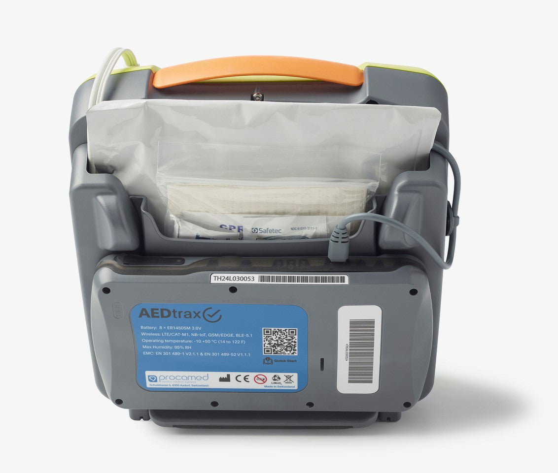 Back view of an AED (Automated External Defibrillator) with visible branding and labels on a white background.