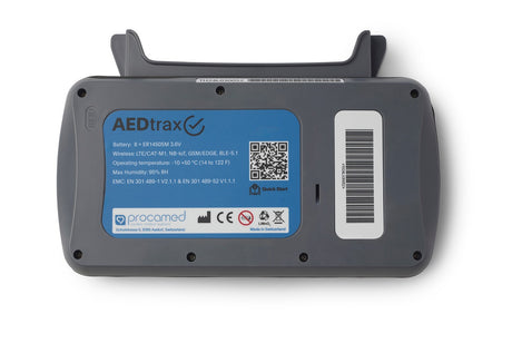 Back view of an AEDtrax device with labels and QR code on a white background