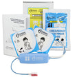 Cardiac Science G3 AED Pediatric Defibrillation Pads and packaging featuring "Cardiac Science" branding, including an instruction manual for Powerheart G3 series AEDs.