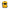 The Defibtech Lifeline VIEW by Defibtech is a yellow AED device with an interactive display screen, user-friendly buttons including a clearly marked “SHOCK” label, stylish black trim, and a handy side strap.