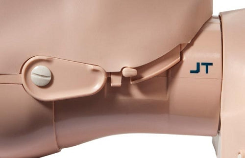 Close-up of a beige plastic mannequin joint with the letters "JT" printed on it, resembling the lifelike features found in a Prestan Professional Adult Training Manikin With Jaw Thrust Head by Prestan.