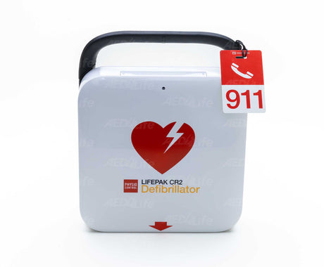 Close up of a Physio-control Lifepak CR2 AED with a 911 tag