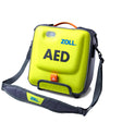 A yellow and black ZOLL AED (Automated External Defibrillator) device fits snugly in the ZOLL AED 3 Carry Case by ZOLL, which features a shoulder strap for easy portability. The case, labeled "AED" in large black letters, has a handle at the top and an orange latch for secure closure.