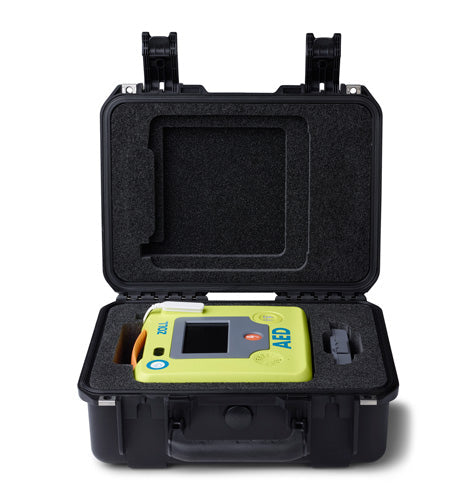 The ZOLL AED 3 Hard Case (Small) by ZOLL is a shock-resistant carrier containing a yellow automated external defibrillator (AED) device with a screen and buttons. This robust case offers optimal impact protection for emergency situations.