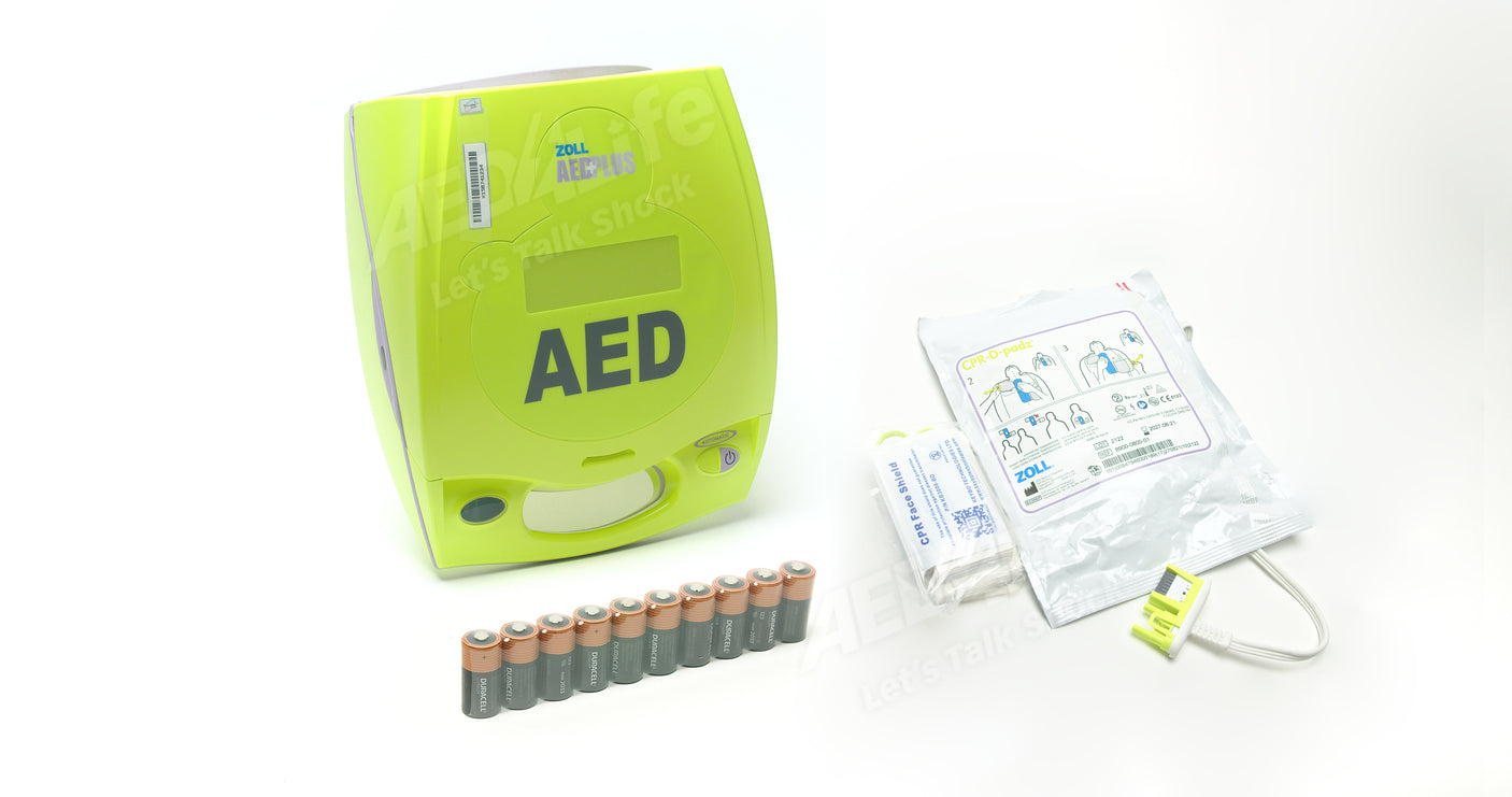 A green ZOLL AED Plus from the brand ZOLL, equipped with Real CPR Help and including batteries and accessories, stands out on a white background.