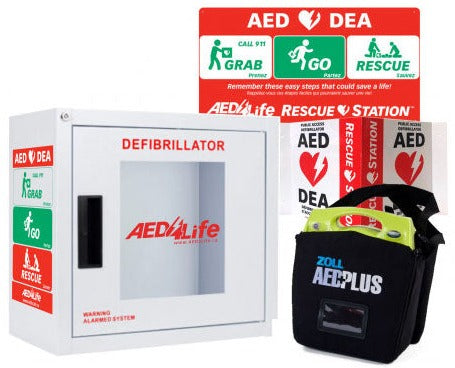 ZOLL AED Plus - Complete Package with instruction signs and emergency kit in a black case labeled "AED PLUS," featuring Real CPR Help for effective guidance during emergencies.